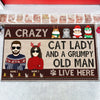 89Customized A crazy cat lady and a grumpy old man live here Christmas Personalized Doormat